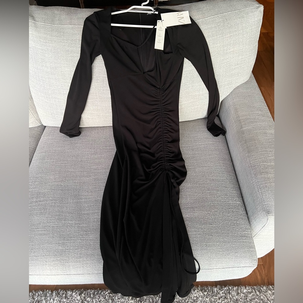 Never worn, still with tags.